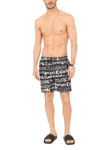 Dolce & Gabbana - Mid-length swim trunks with all-over Dolce&Gabbana print